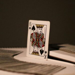 Close-up of King of Spades playing card, symbolizing chance and luck in a casino setting.